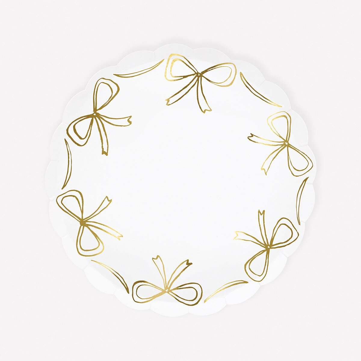 Gold bow print paper plates for Christmas parties