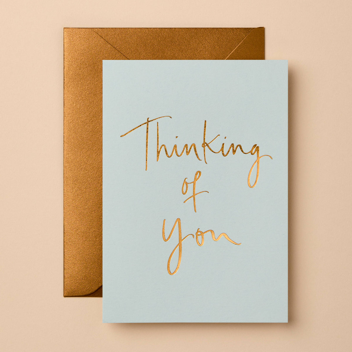 Thinking of You card by Gabrielle & Celine, gold foil lettering on cool blue
