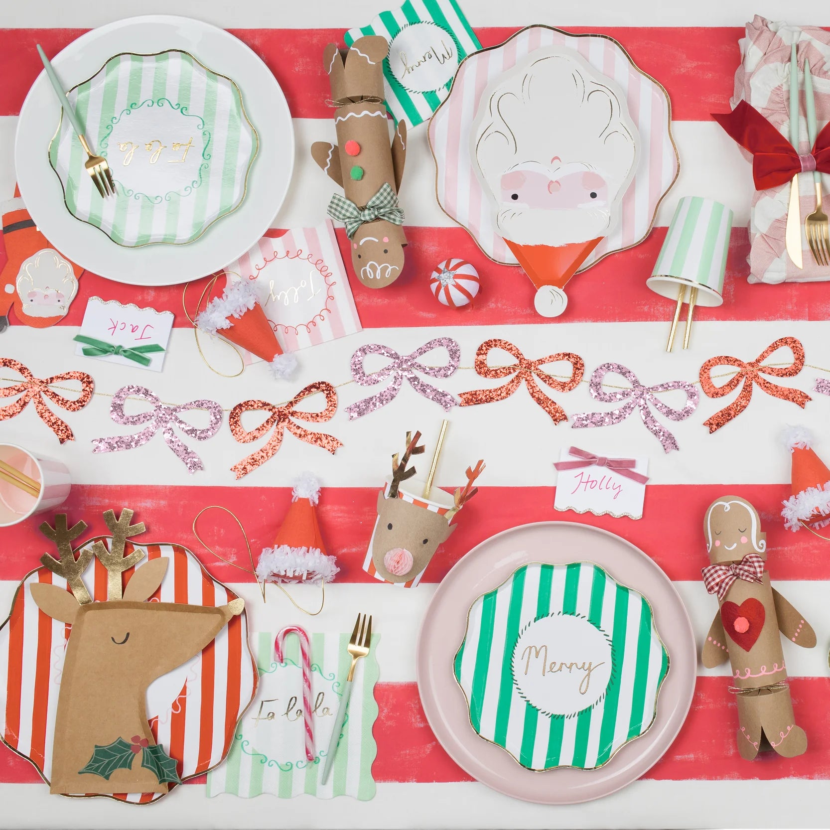 Red and pink glitter bow garland styled in a party setting