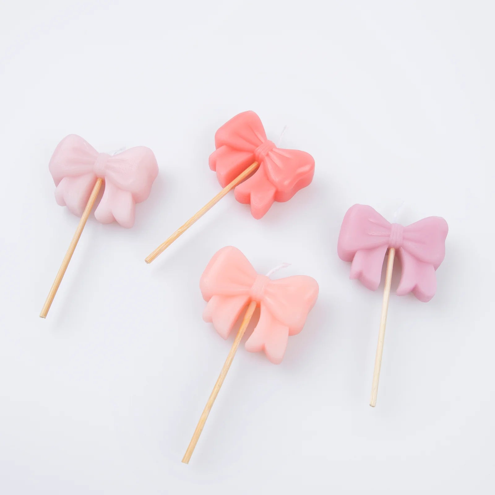 PINK BOW SHAPED CAKE CANDLES