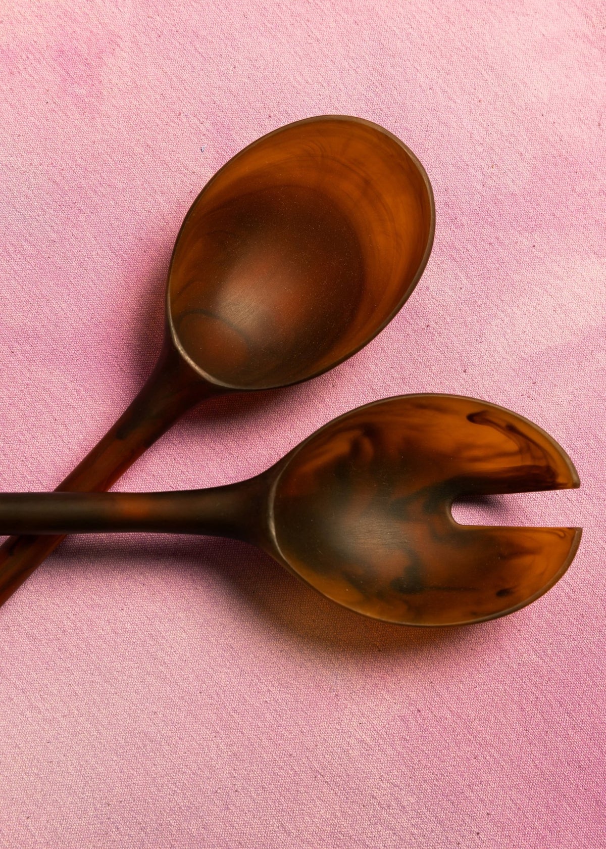 Amber resin salad servers shown from another angle