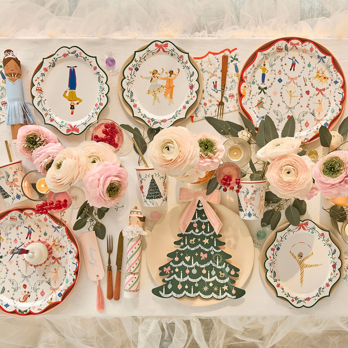 Christmas tree plates illustrated with ornaments, garlands and candles