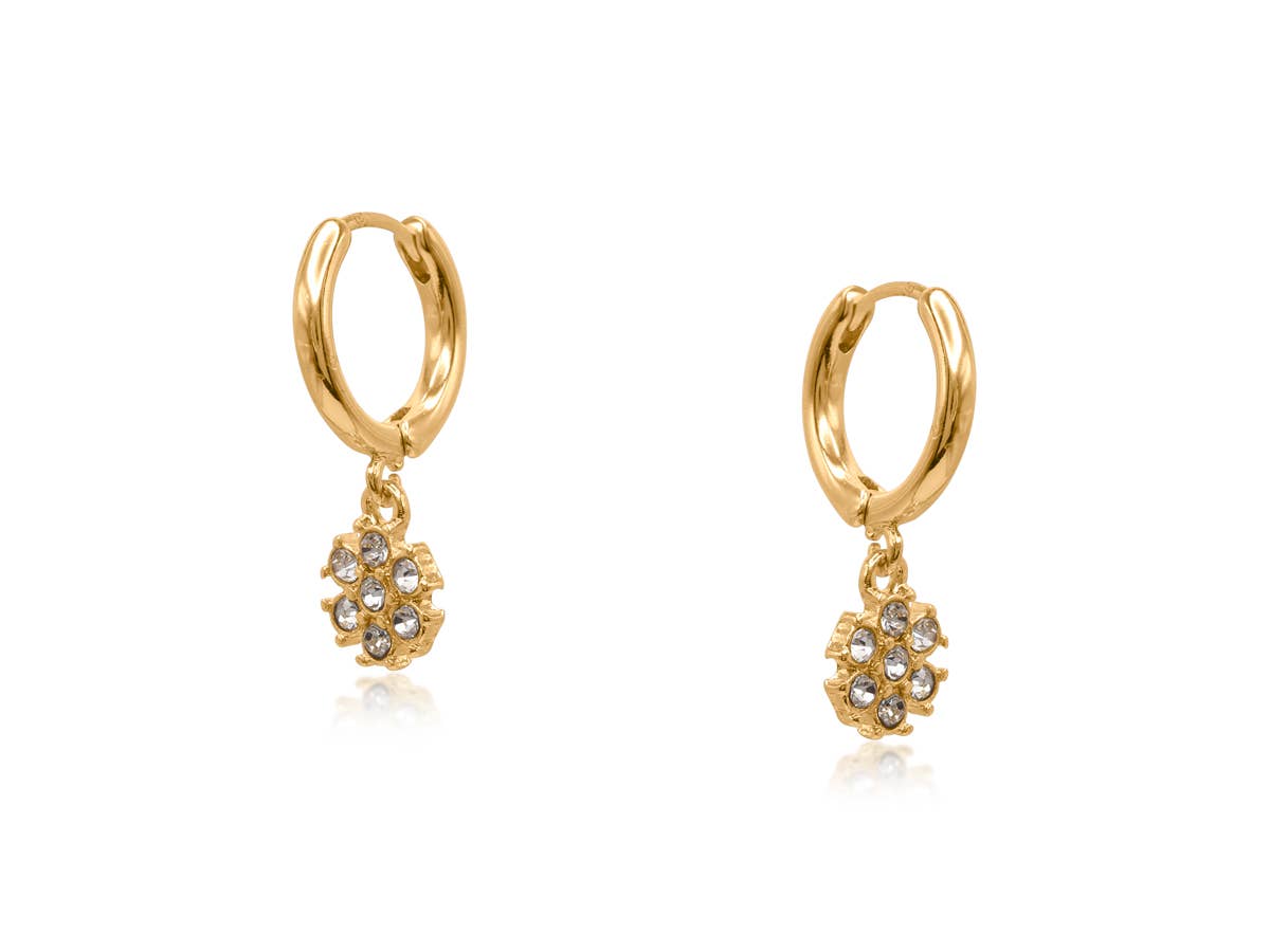 Gold Symbols of Power petite huggie earrings with a crystal flower charm