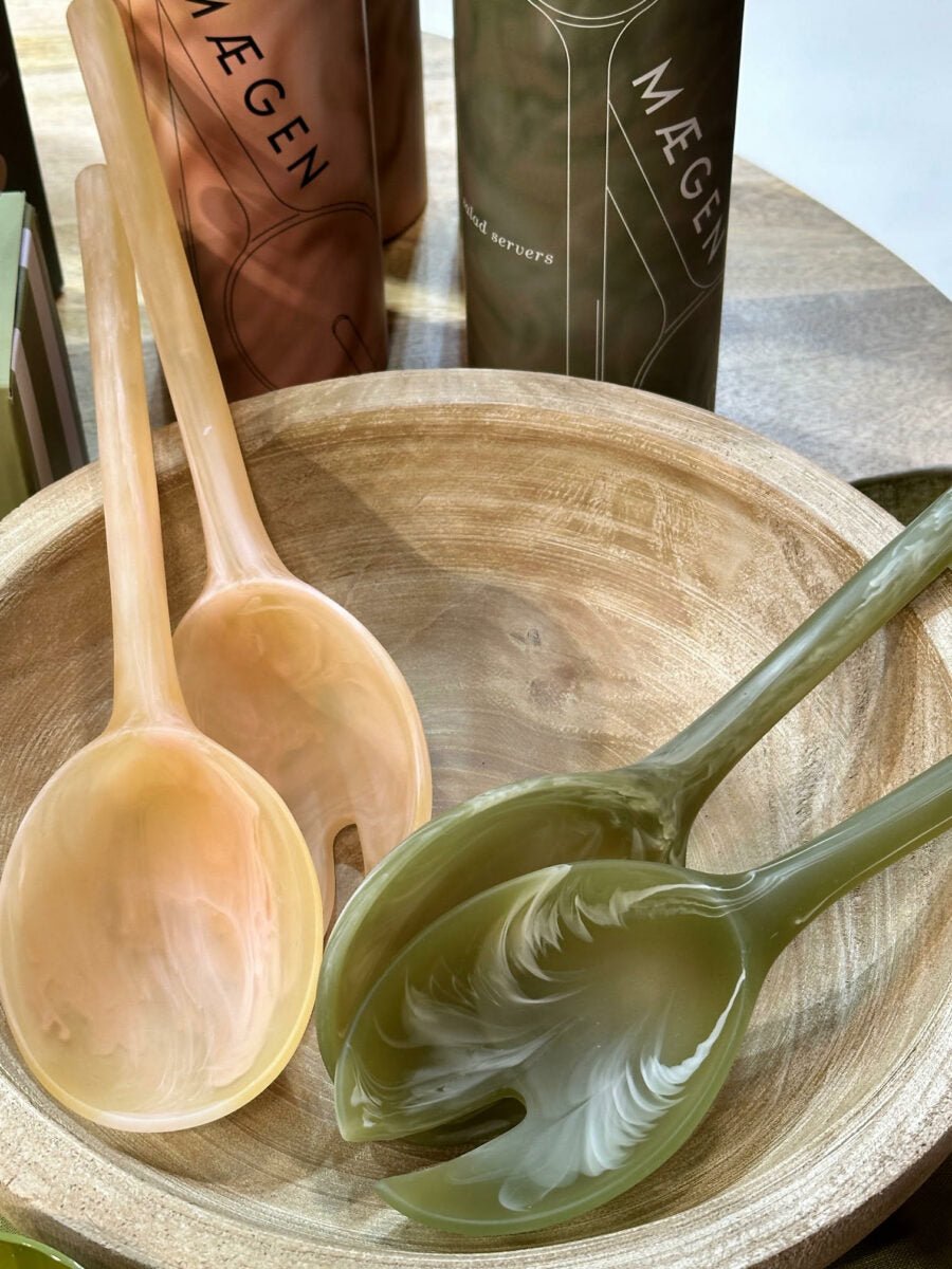 Coral resin salad servers styled on a table