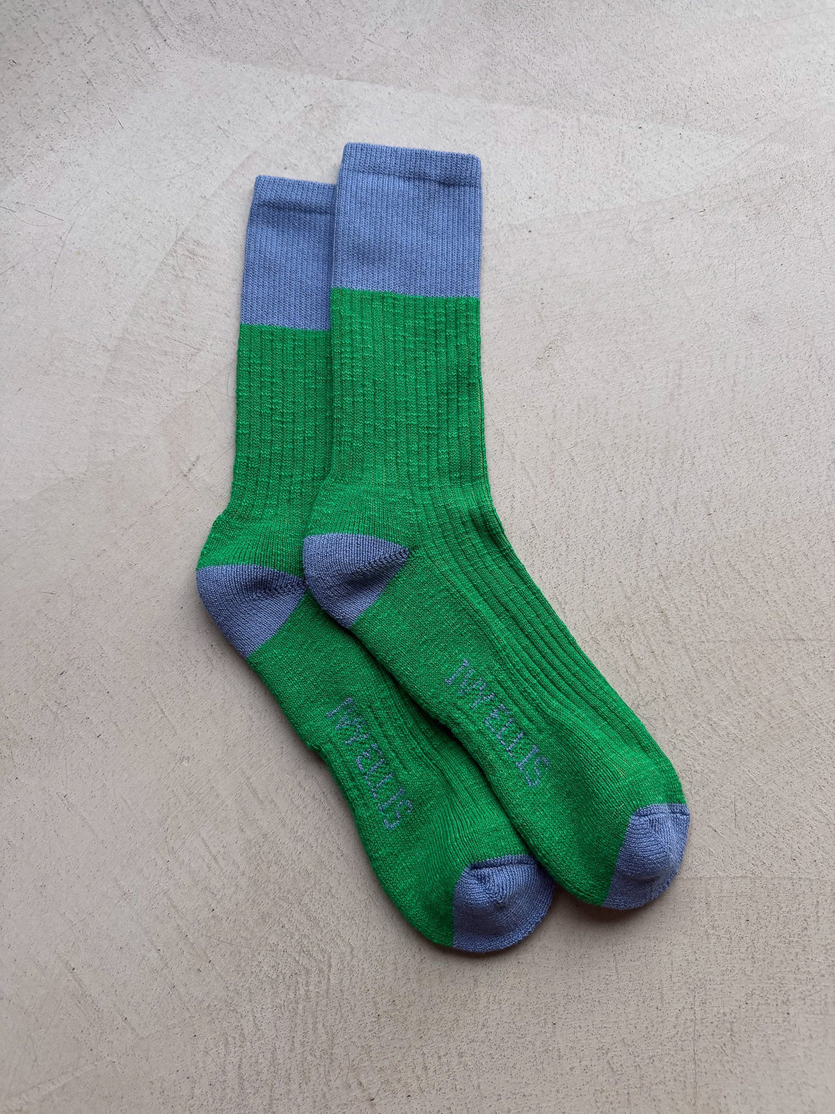 The Boris men's crew length socks by Ivy Ellis in green slub with a blue accent