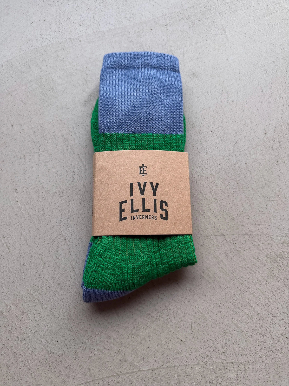 The Boris men's crew length socks by Ivy Ellis in green slub with a blue accent