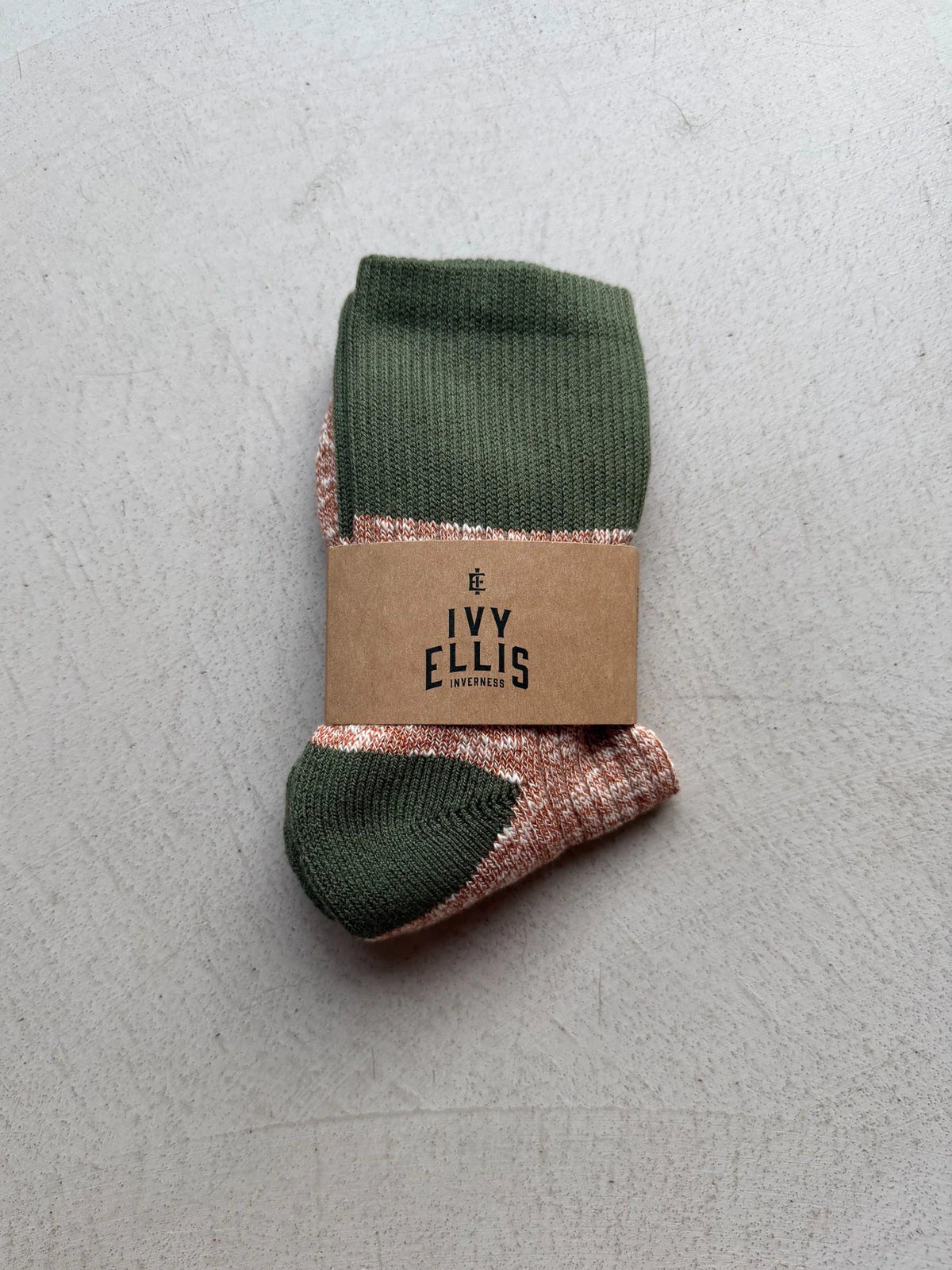 The Ivan women's quarter length socks by Ivy Ellis in brown slub with a green accent