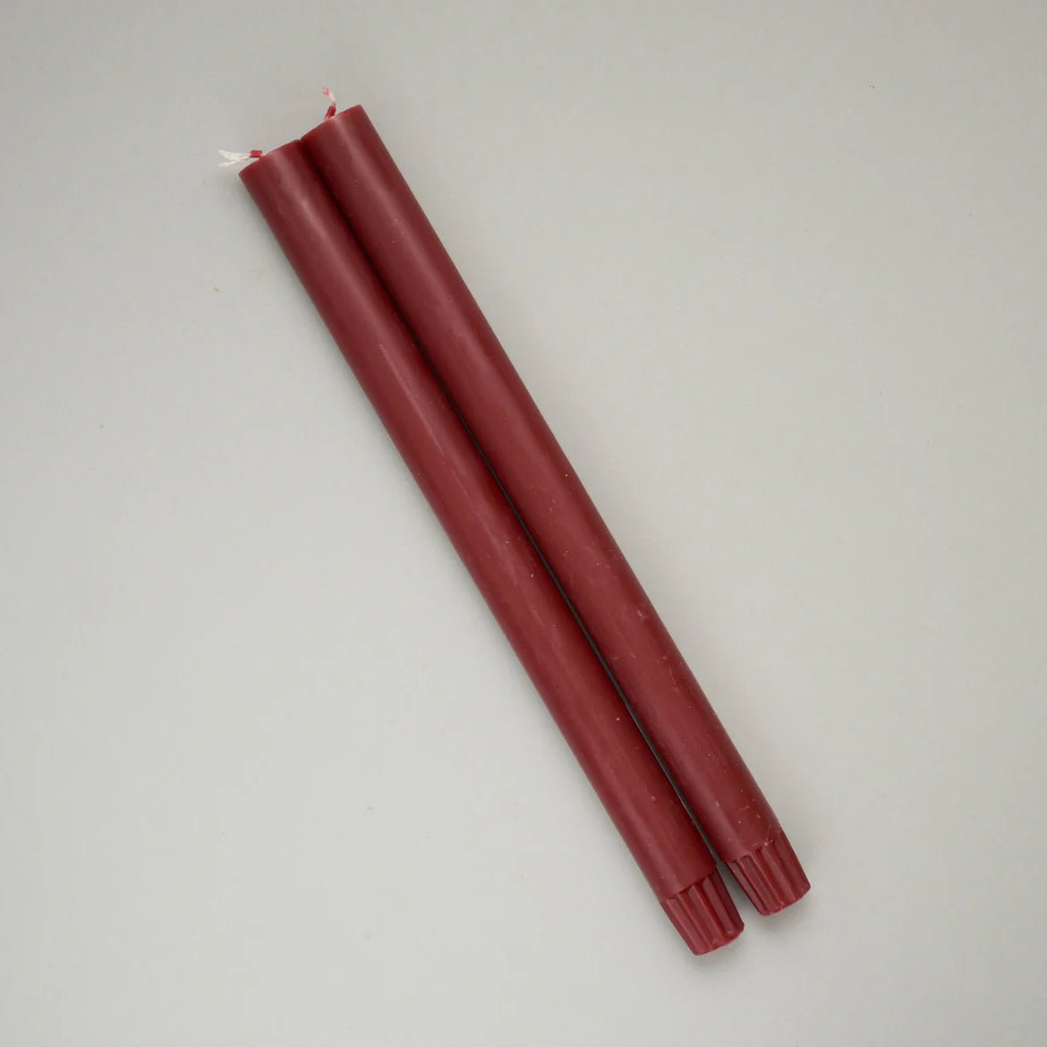 BERRY RED DINING CANDLES (PAIR - OTHERLETTERS