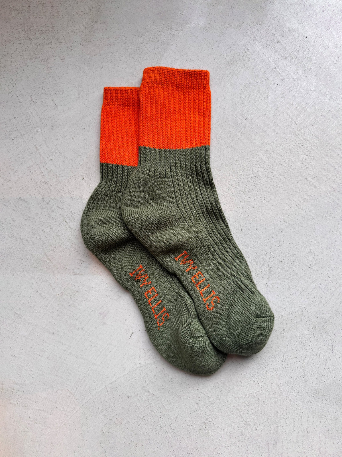 The Deerhunter women's quarter length socks by Ivy Ellis in blaze orange and deep green
