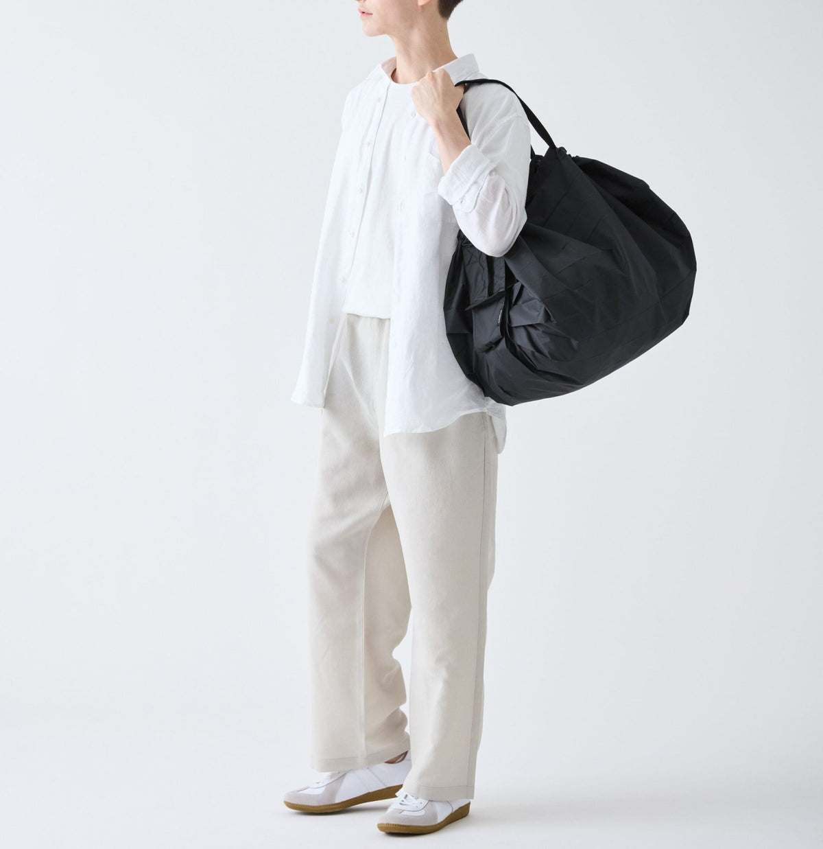 JET BLACK SHUPATTO COMPACT BAG | L - OTHERLETTERS