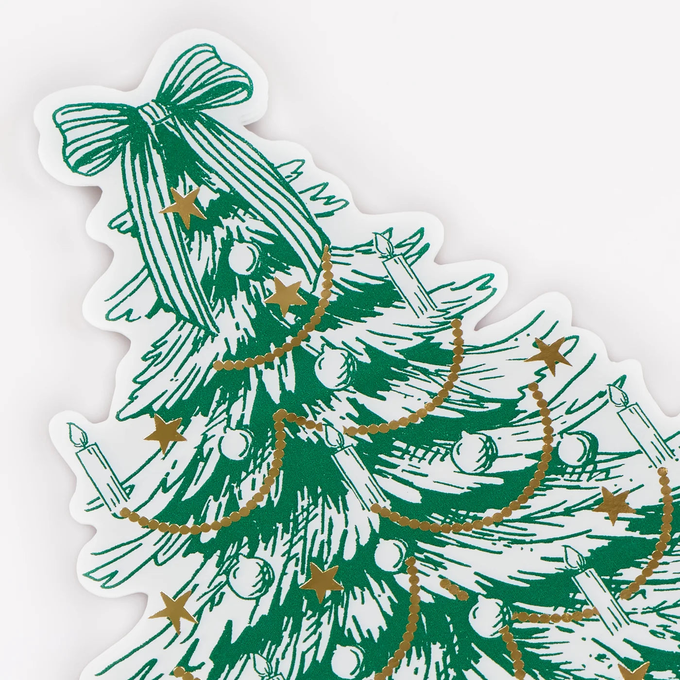 Christmas tree shaped napkins topped with an elaborate bow