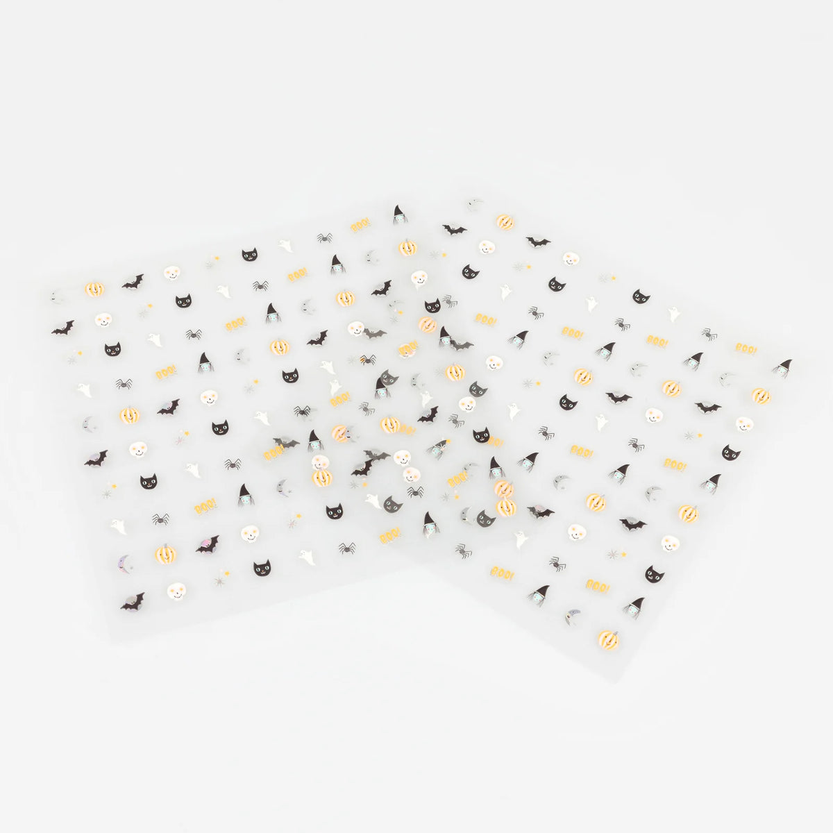 Halloween nail stickers applied to a set of nails