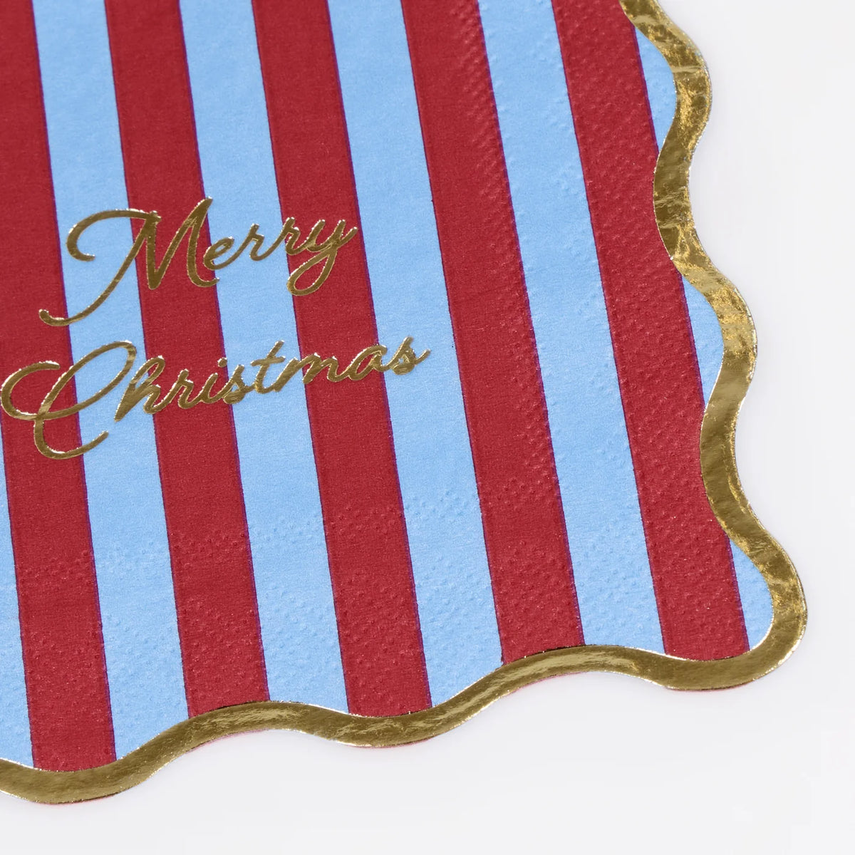 Small napkins with Merry Christmas printed in shiny gold foil
