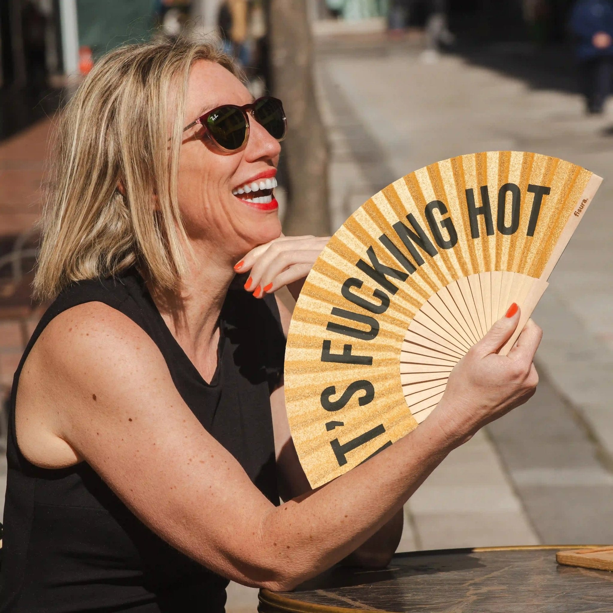 * PRE ORDER * GOLD GLITTER 'IT'S FUCKING HOT" HAND FAN - OTHERLETTERS