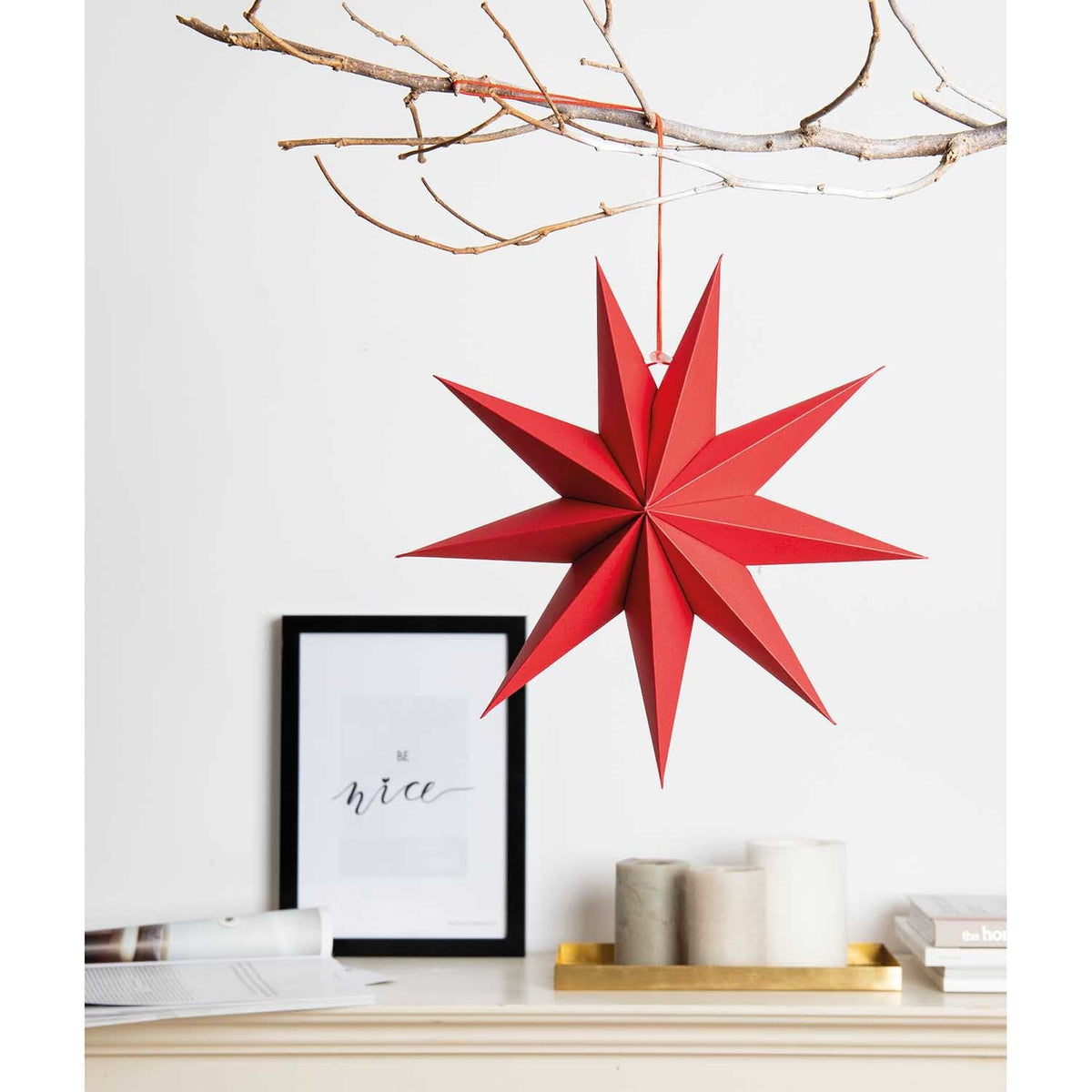 Red 9-point paper stars grouped together as party decor
